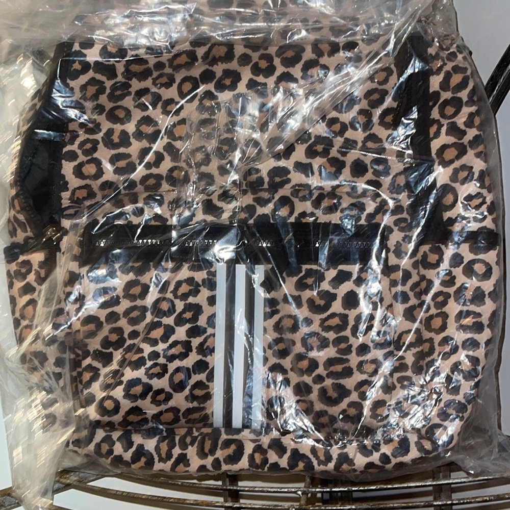 New with tags in bag leopard soft nice backpack huge too retails at 129